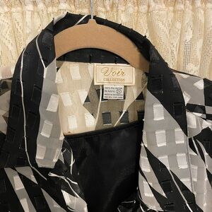 Voir Collection Black and White womans two piece set.